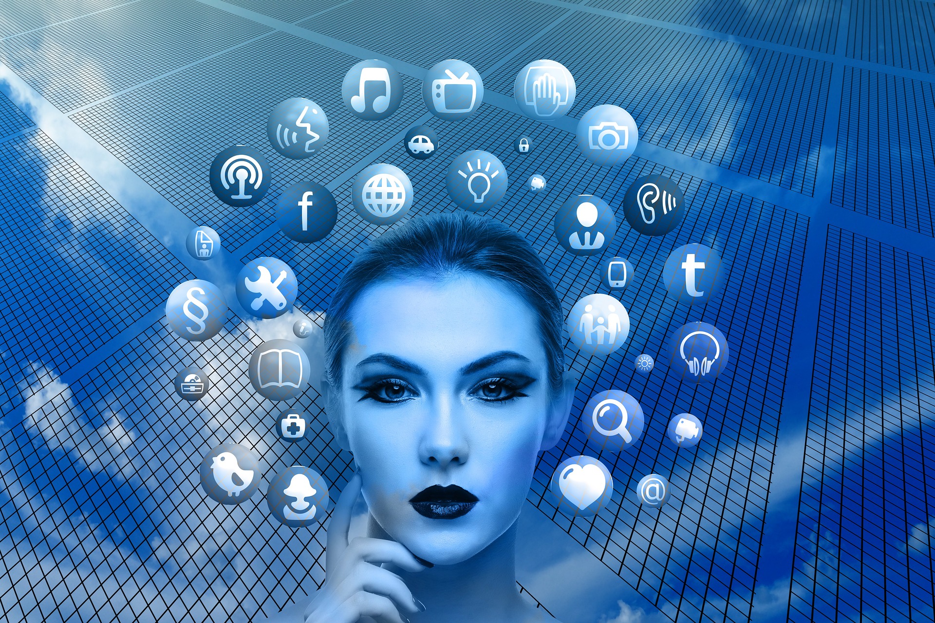 The image shows a feminine head, seemingly in thought, surrounded by social media icons. The image is used under Pixabay License.